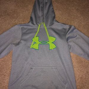 grey and green under armor sweatshirt